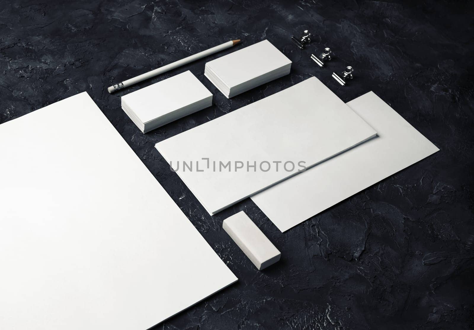 Blank corporate identity. Stationery template on black plaster background. Branding mockup.