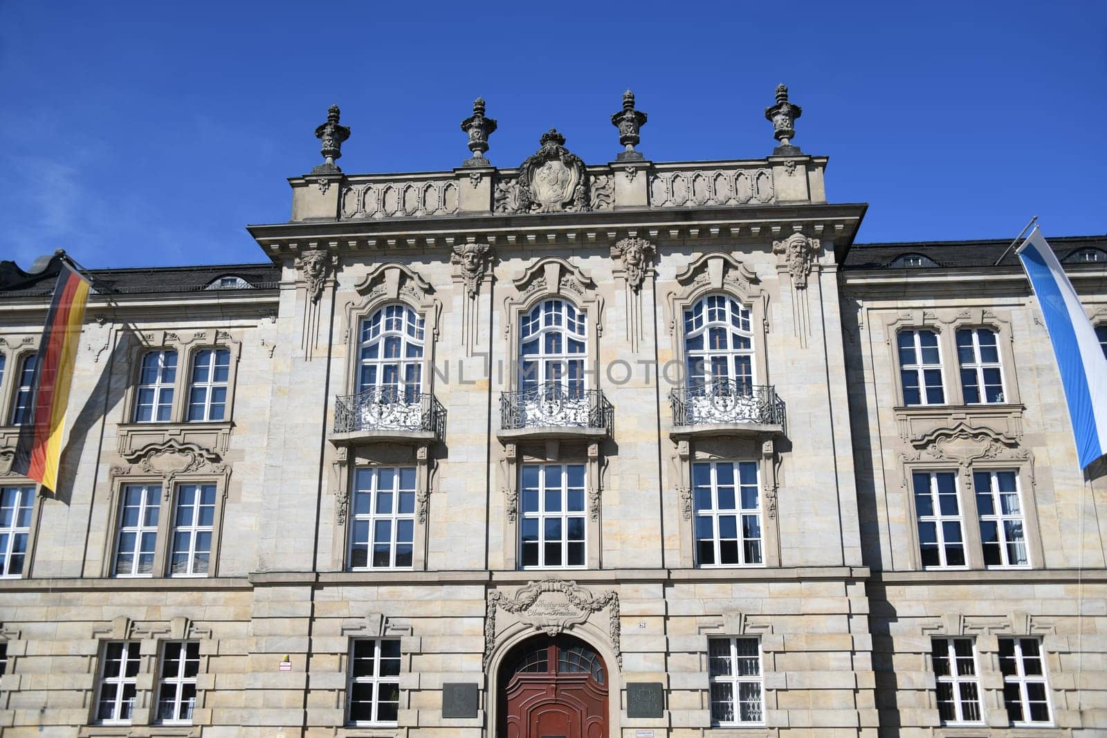 The historic sandstone presidential building of the government building of Upper Franconia in the city of Bayreuth,Bavaria,Germany. The building was inaugurated in 1904.