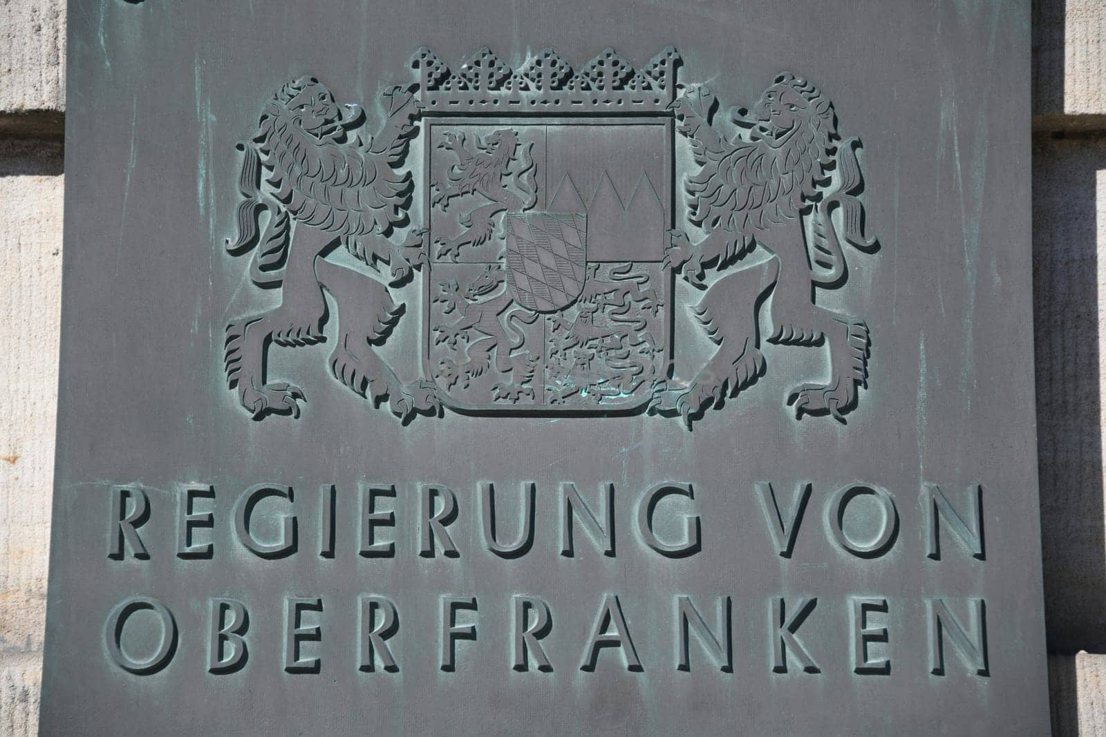Bronze shield,Bronze shield from the government of Upper Franconia on a historic building in Bayreuth. The city of Bayreuth is located in Bavaria,Germany.