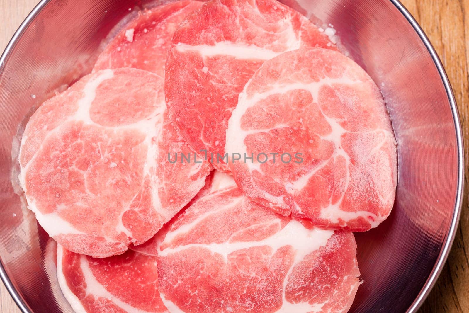Raw pork on plate, Korean traditional style fresh pork beef belly BBQ, Japanese meat hot pot or Shabu in the restaurant, barbecue food