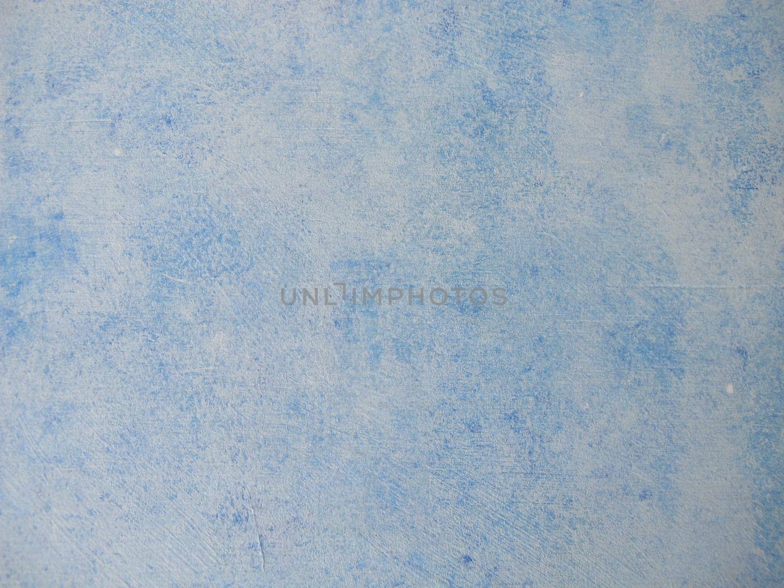 Wood painted with blue chalk paint and paint roller in vintage style