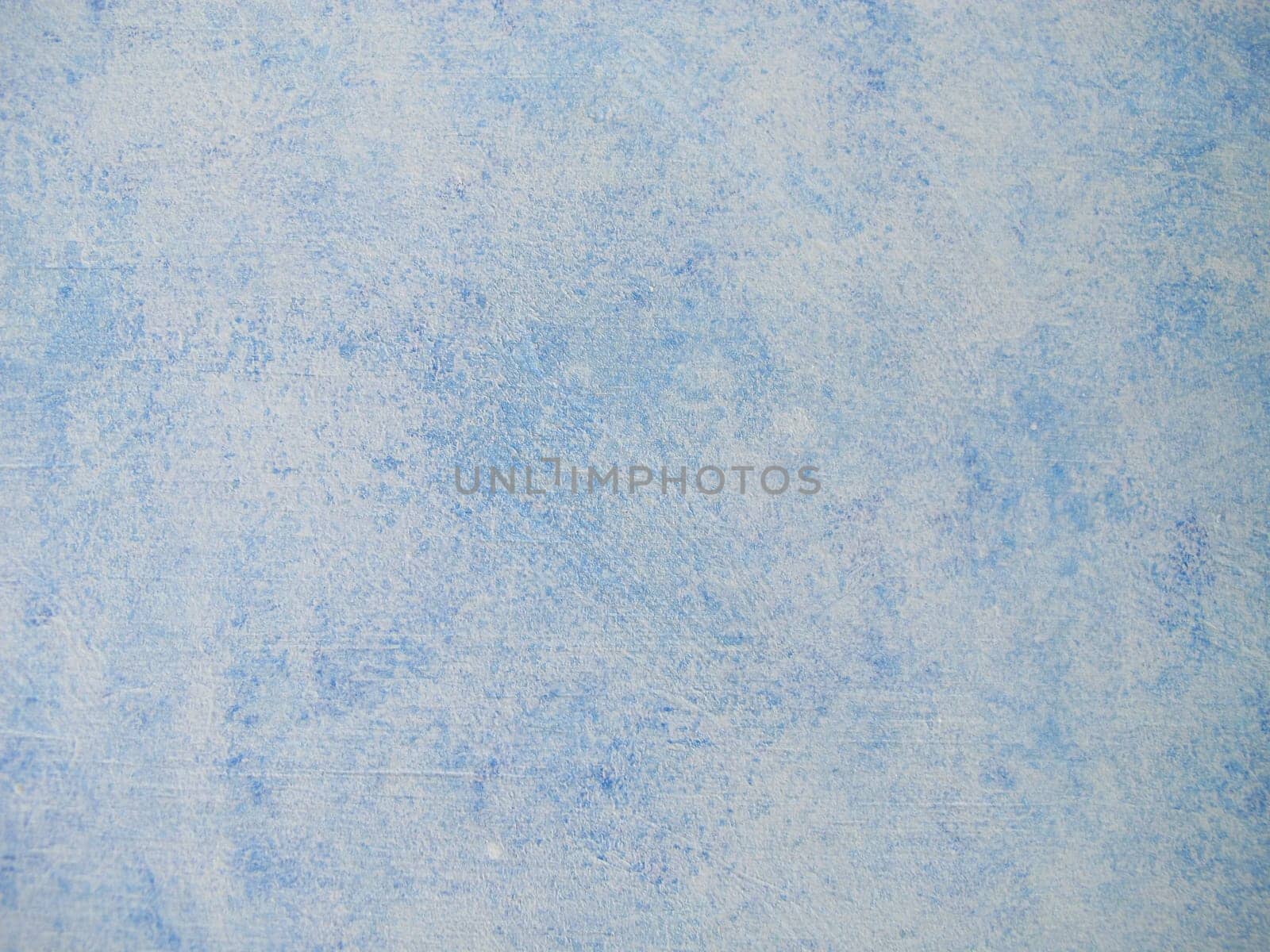 Wood painted with blue chalk paint and paint roller in vintage style