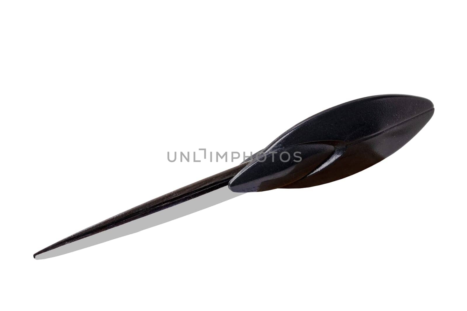 Closeup of a letter openers tool or a black knife designed for opening letter envelopes isolated on a white background. Clipping path. Macro.