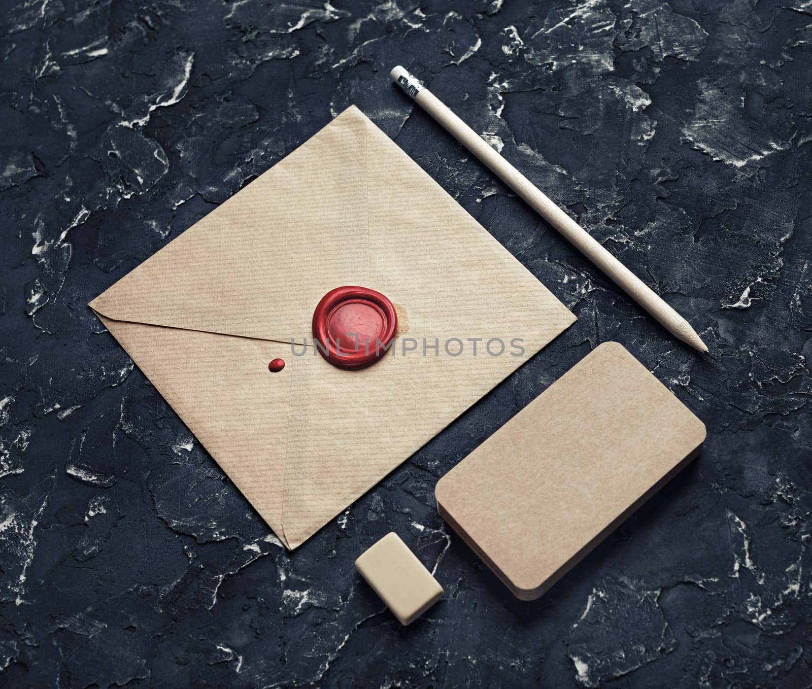 Blank kraft stationery set on black plaster background. Template for branding design. Branding mock up.