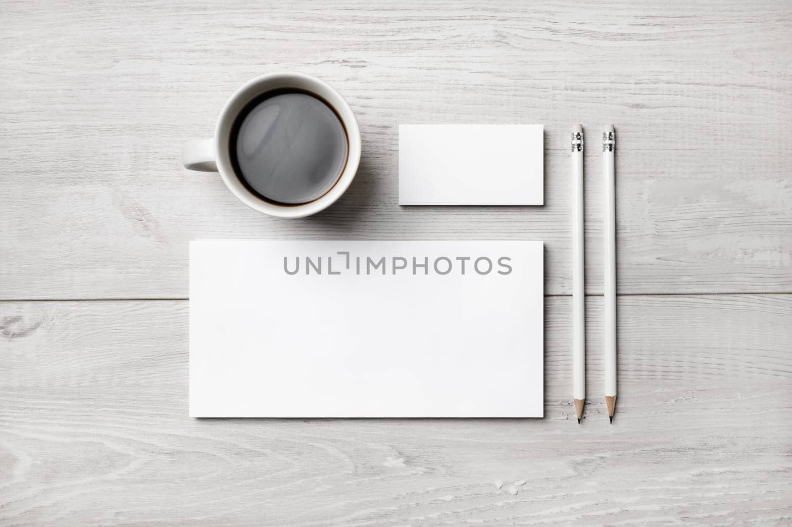 Corporate identity template. Branding mock up. Blank business stationery mock-up on light wooden background. Flat lay.