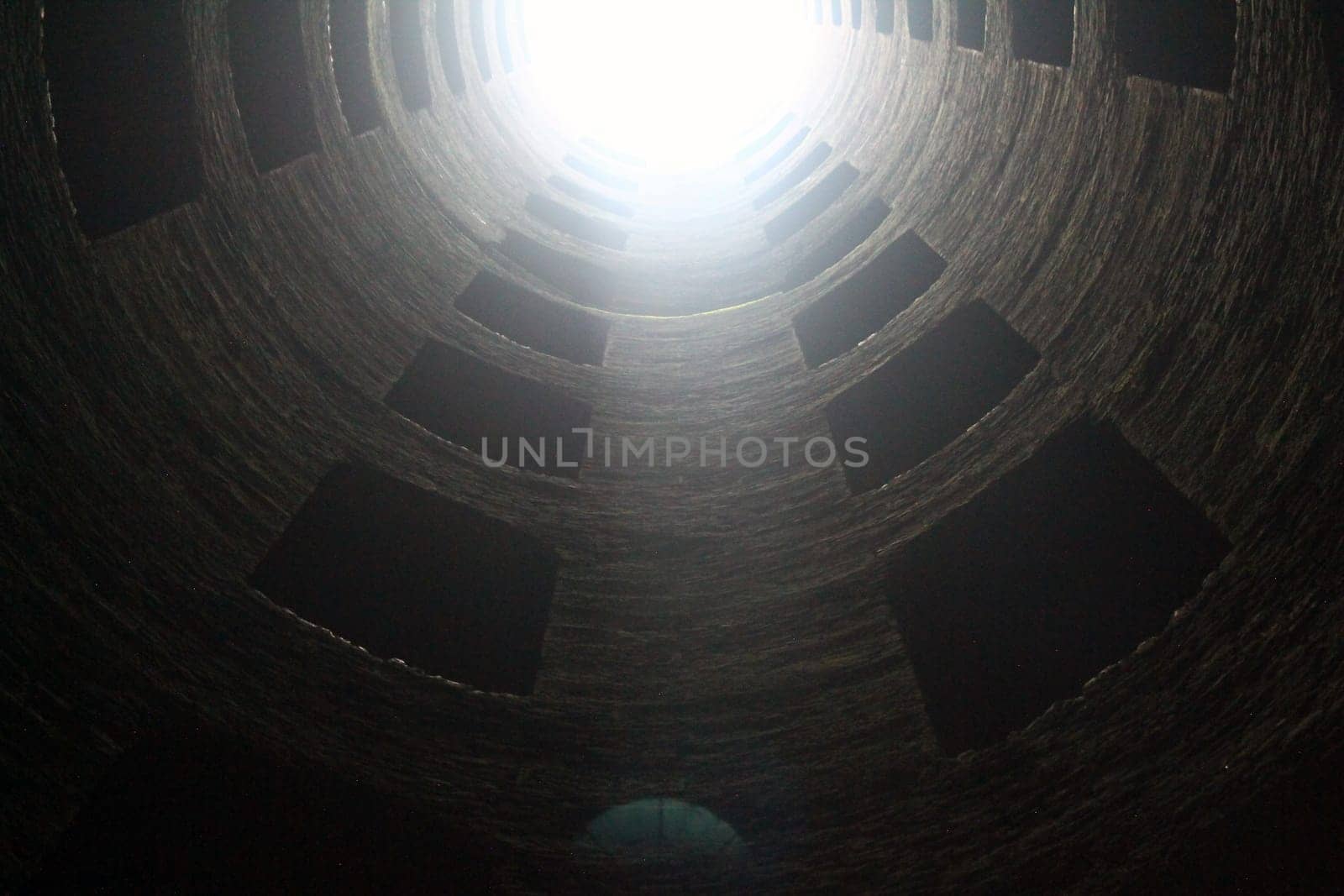 View of half of the San Patrizio Well (Pozzo di San Patrizio) with the sun coming in located in Orvieto in Umbria in Italy