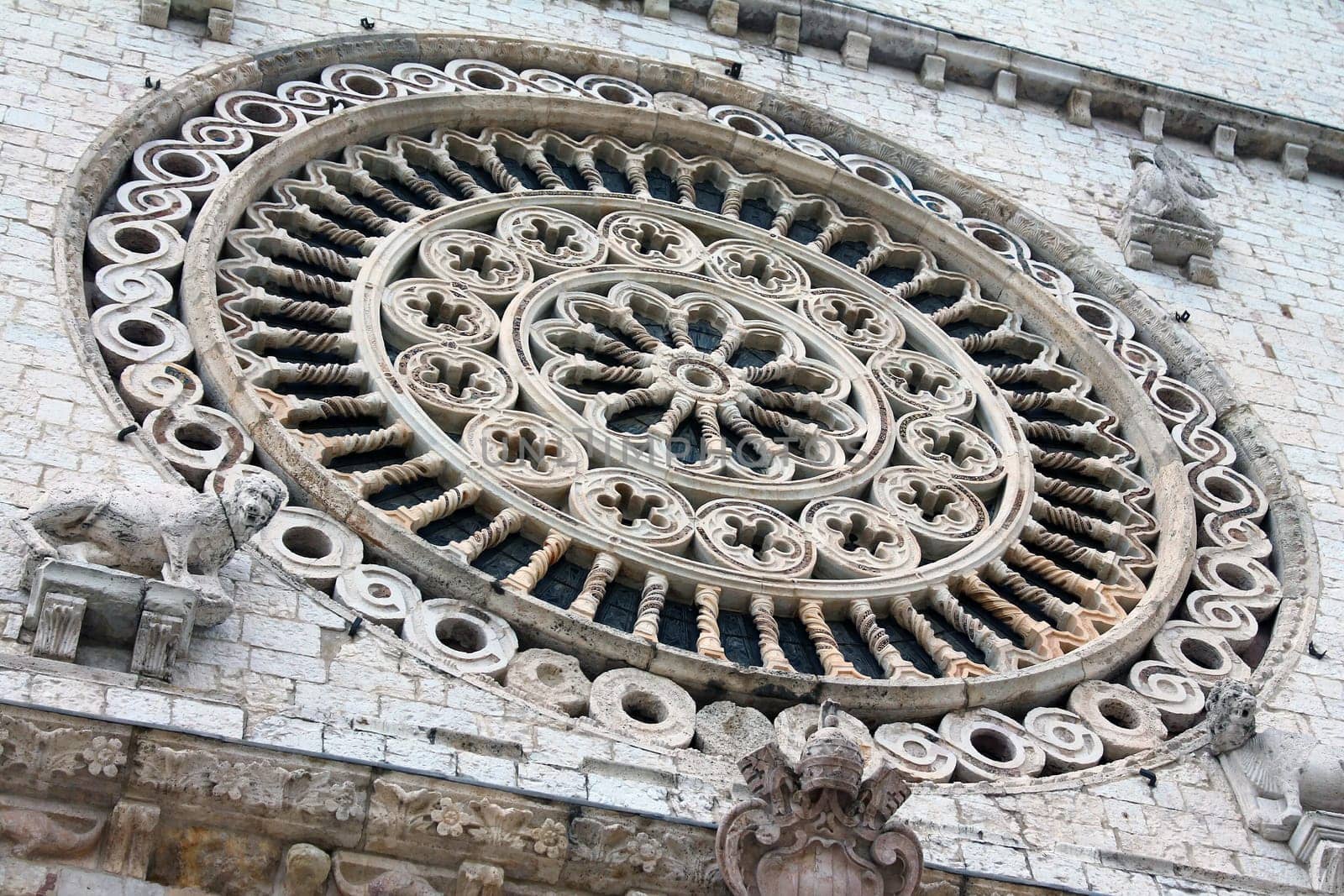 The masterpiece rosette of the Assisi Abbey in Umbria in the center of Italy