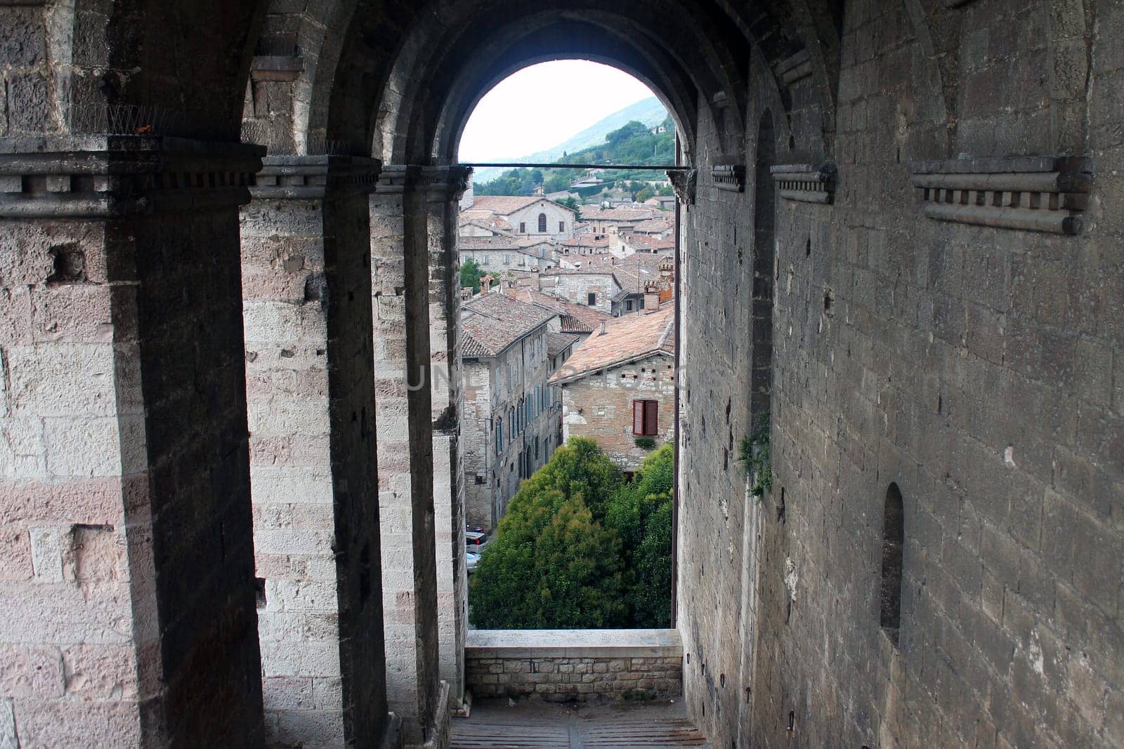The arches of the medieval buildings in the center of Gubbio in Umbria in Italy