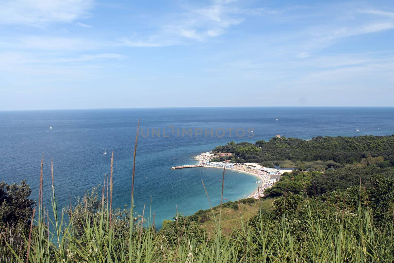 Panoramic picture of the Conero area with its green and white beach and turquoise Adriatic Sea in Italy