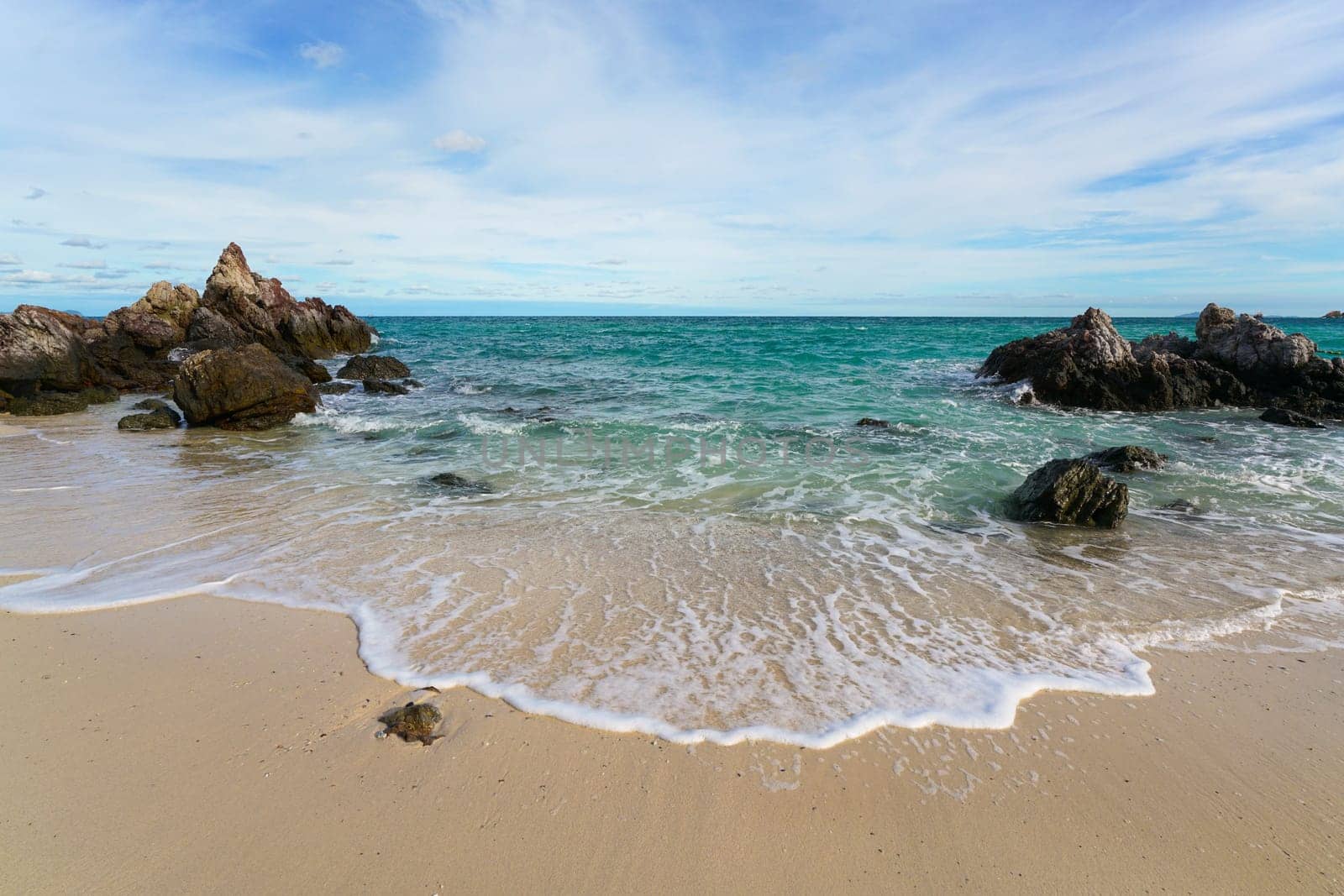 Sand beach among rocks, koh lan island thailand