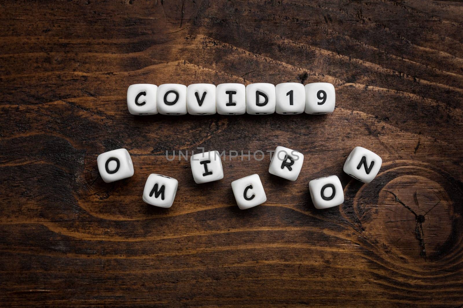 Corona virus Covid-19 vaccine text on wooden background