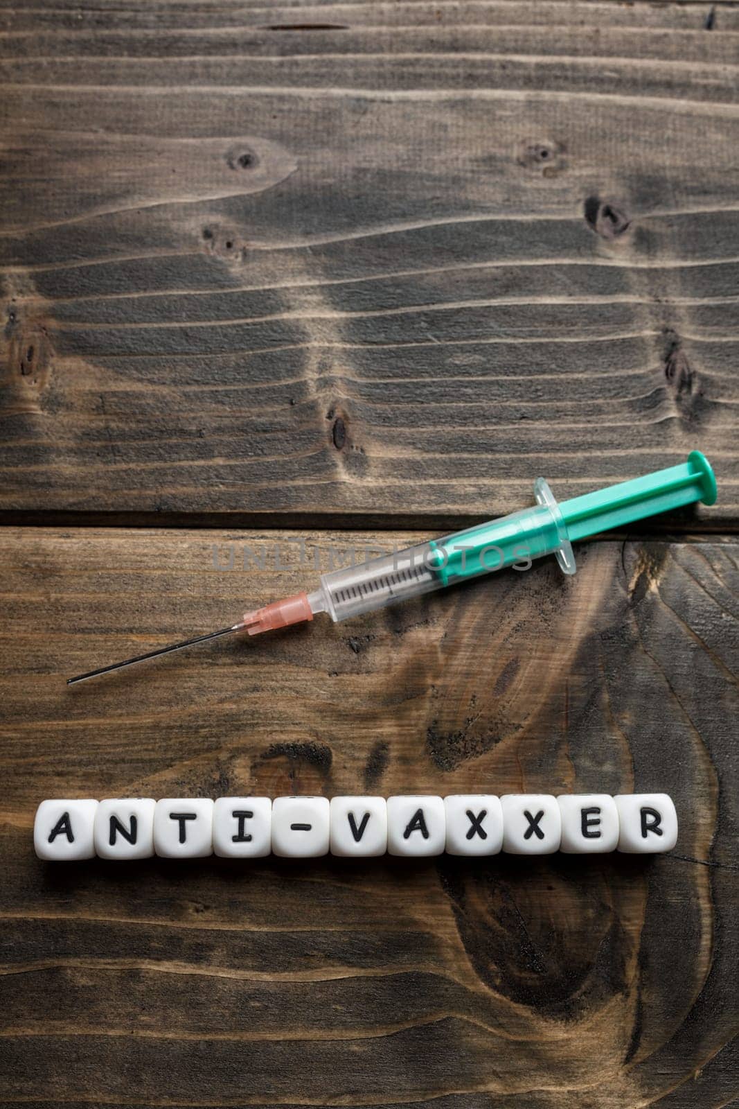Corona virus Covid-19 vaccine text on wooden background
