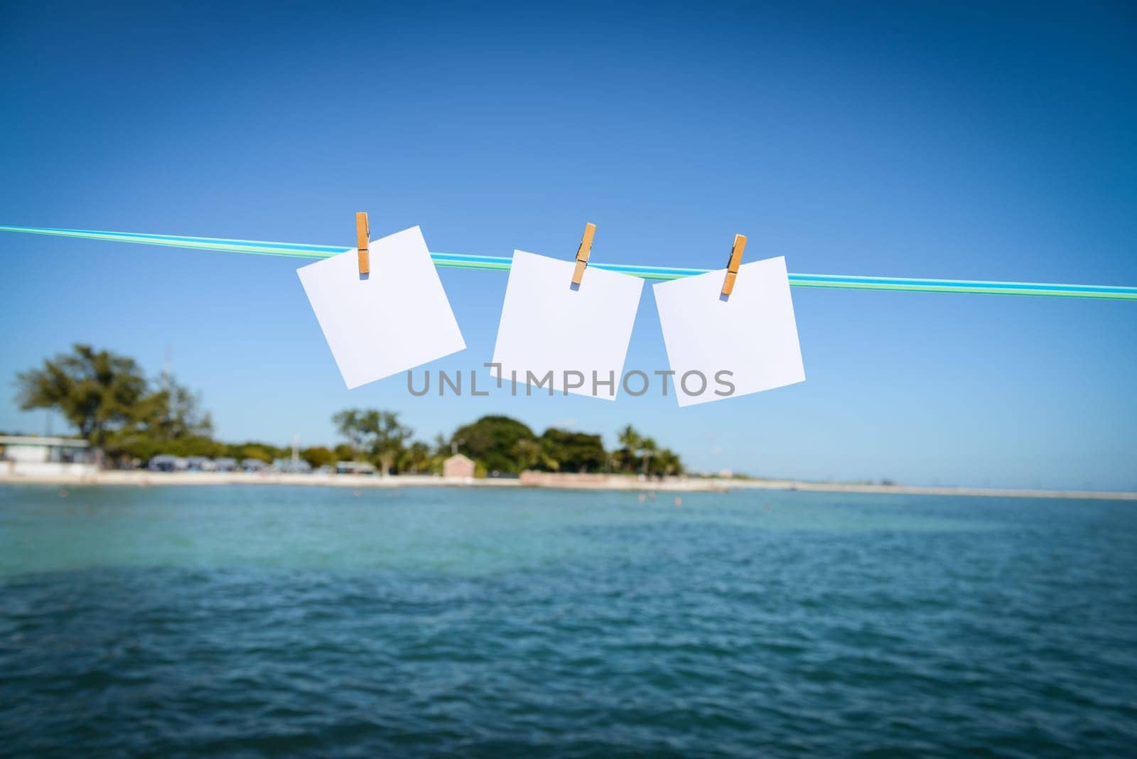 tropical landscape with island and white paper card for layers and messages