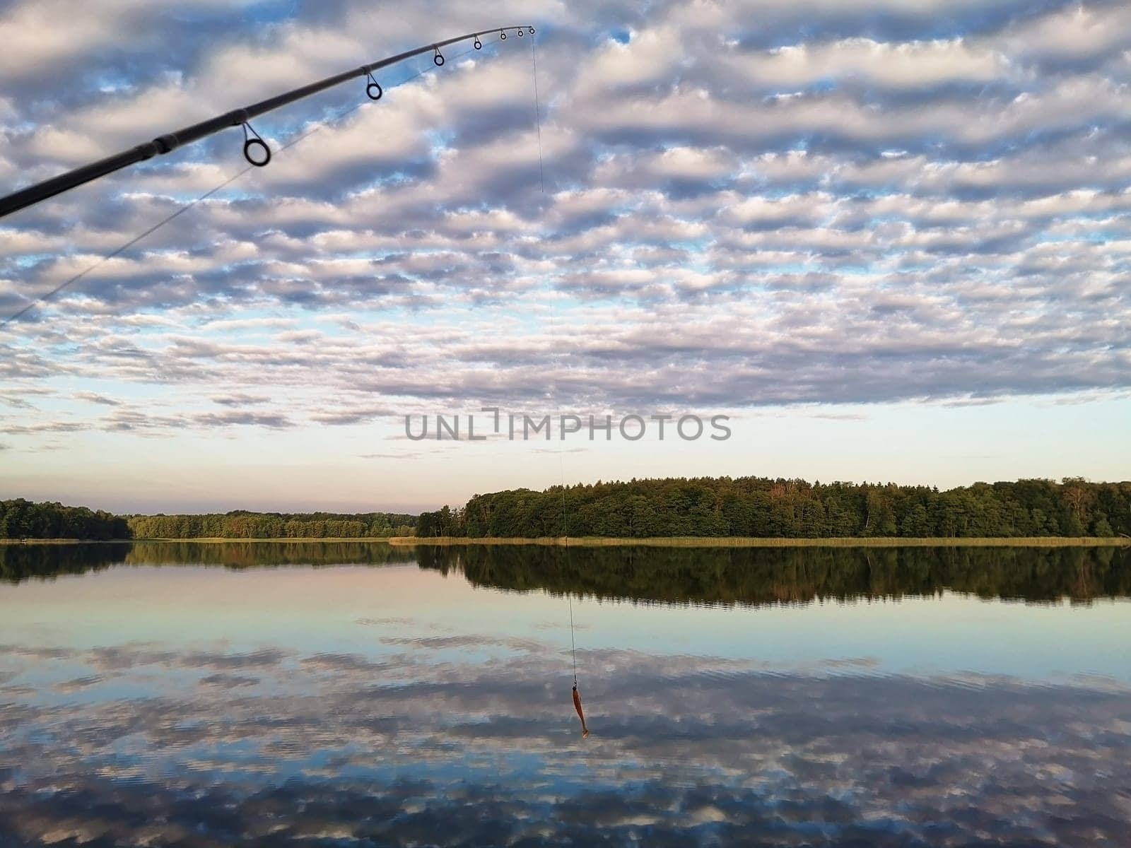 Anglers at Luebbesee near Templin, Brandenburg, Germany