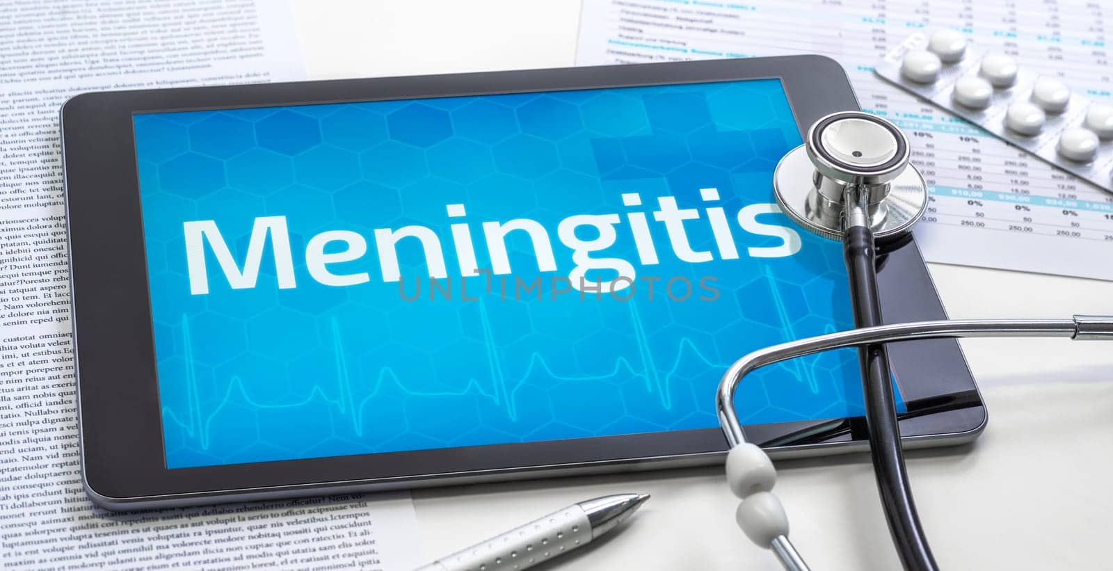 The word Meningitis on the display of a tablet