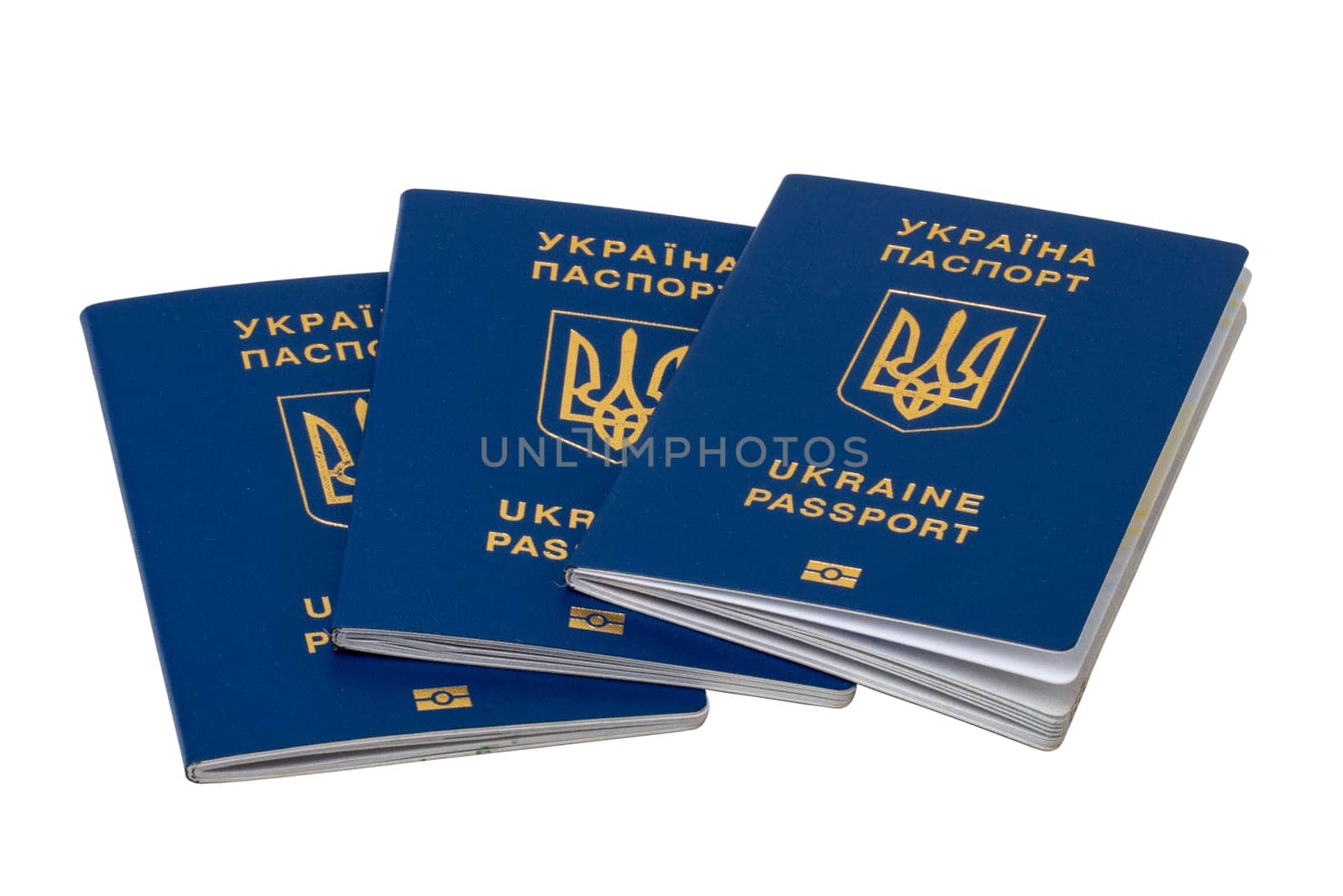 Three passports of Ukrainian citizens or migrants for visa-free travel to the European Union isolated on white background. Clipping path. Refugees in European countries.