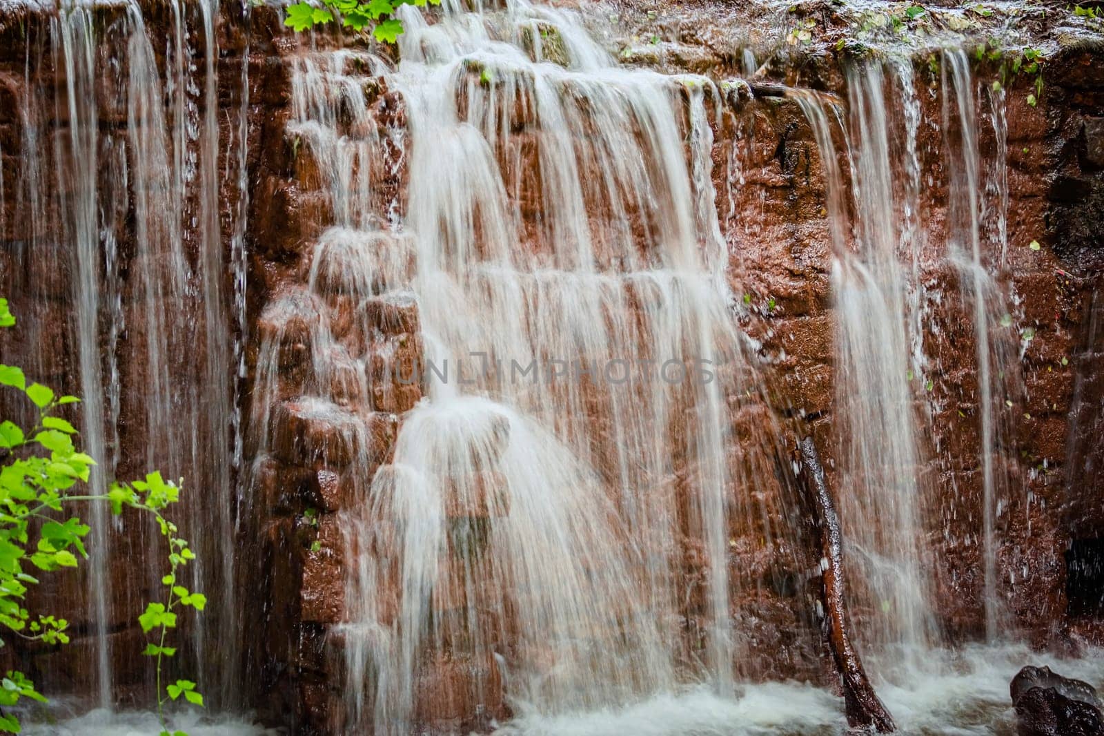 Small waterfall in the city garden