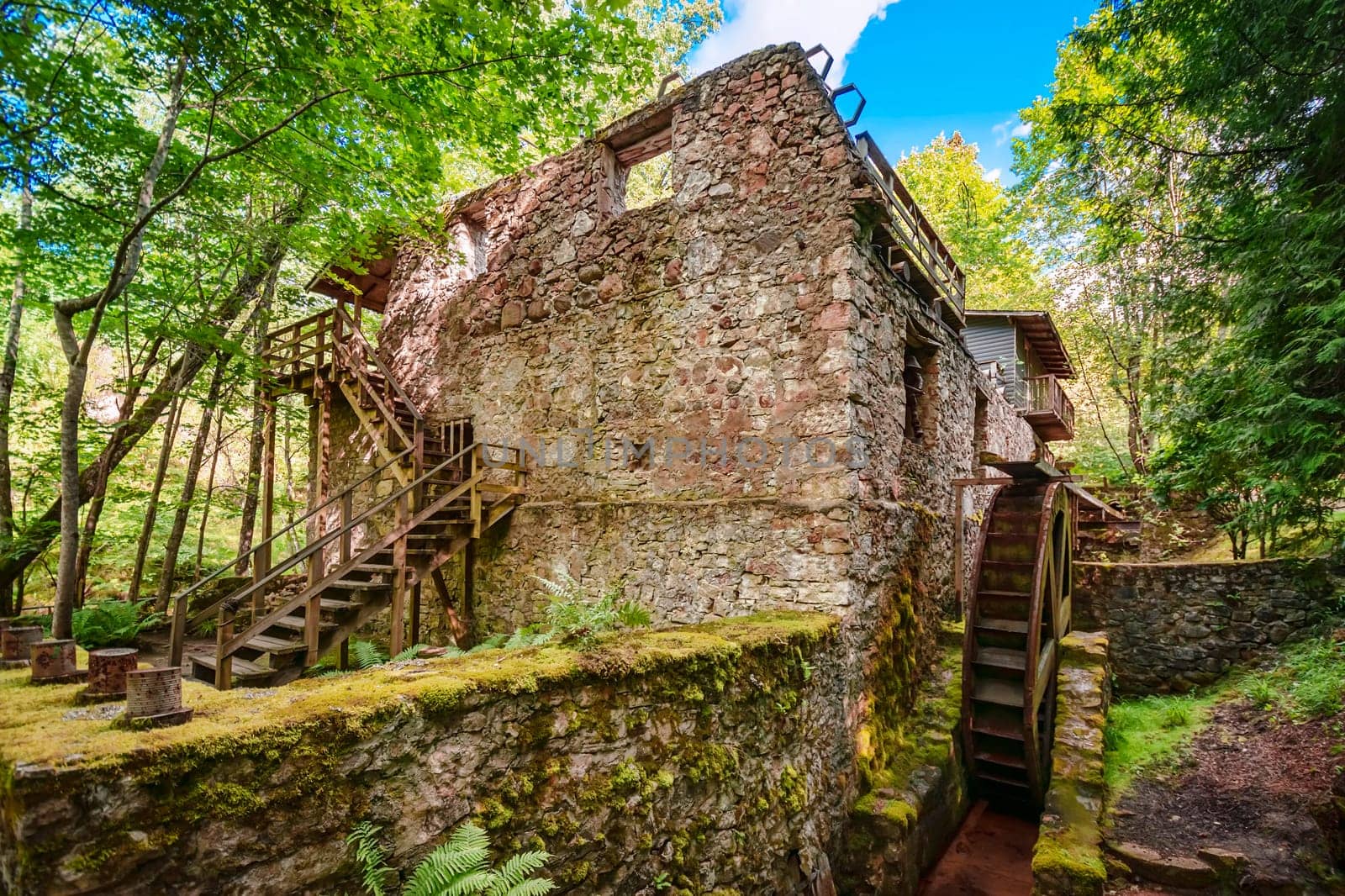 Old ruins of water mill the forest