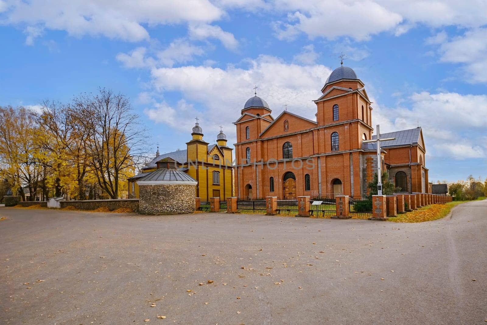 Old and new buildings of Malnava Holy Mary Mother of Rosary Church