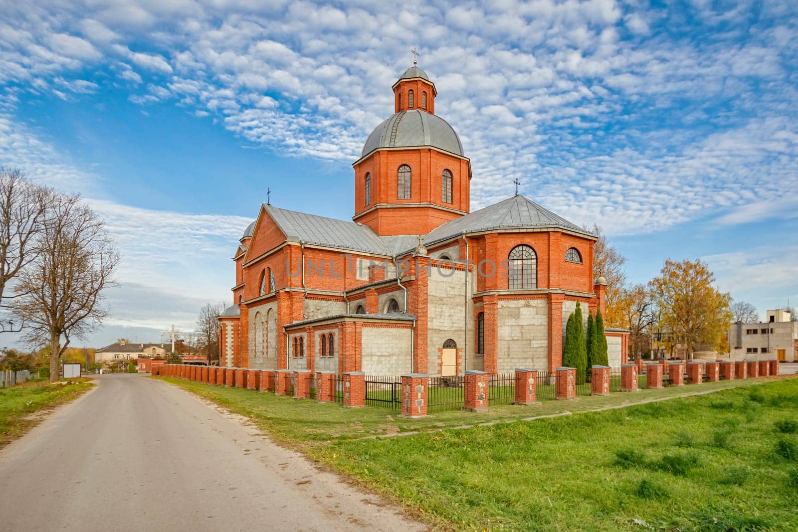 Old and new buildings of Malnava Holy Mary Mother of Rosary Church