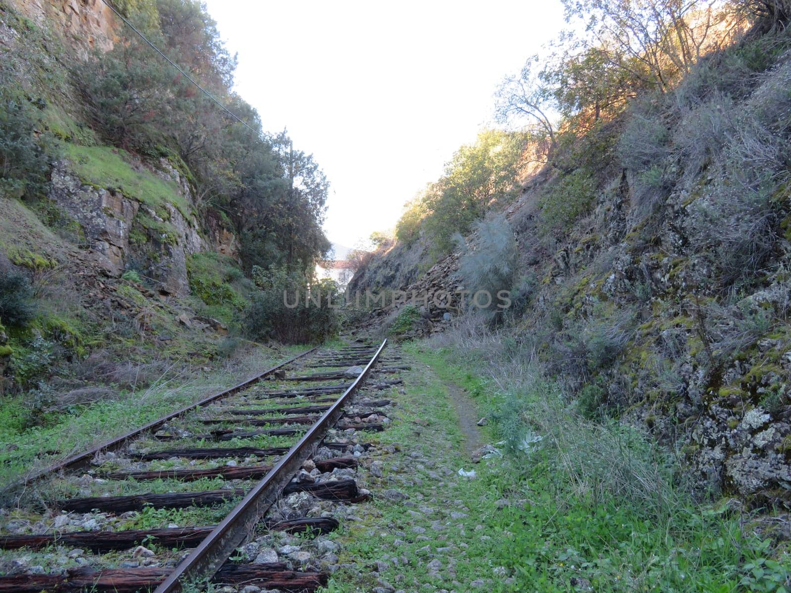 iron road bridges metal rail light at the end of the tunnel train transport