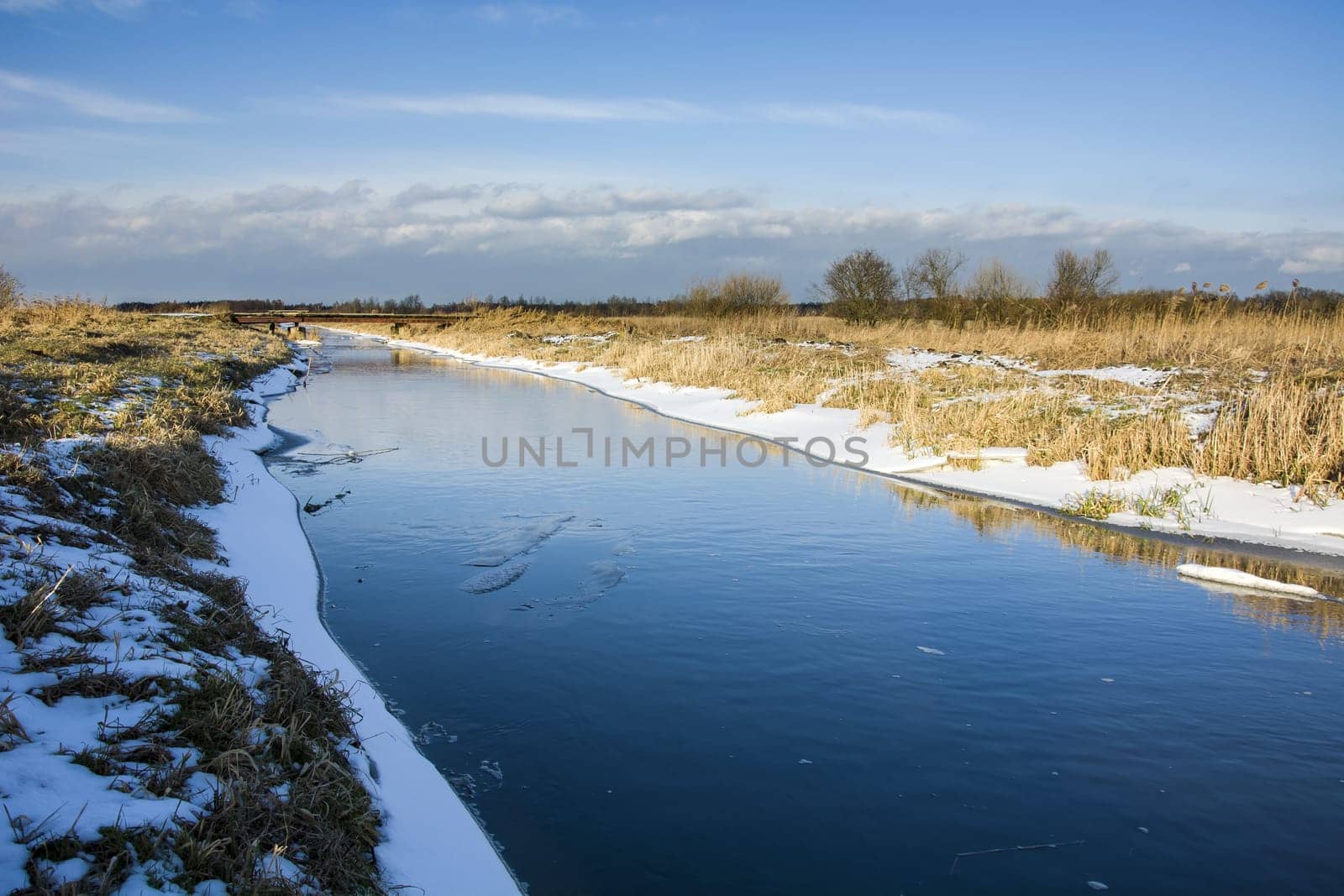 Little Uherka River in eastern Poland, winter sunny day