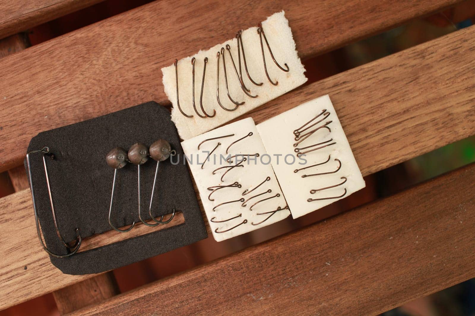 sets of different sizes of fishing hooks on the table close-up