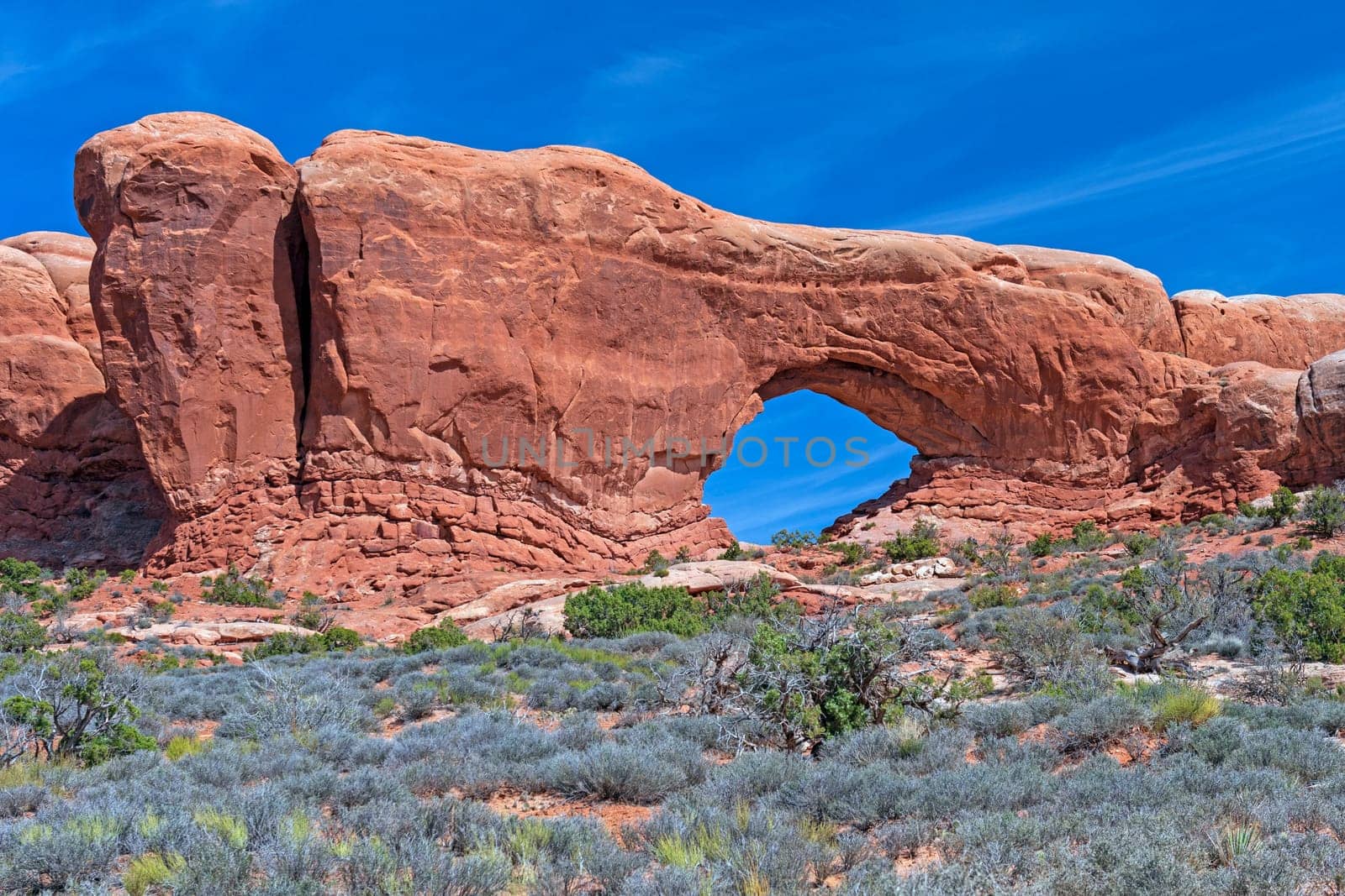 Dramatic Vista with a Window in the Desert in Arches National Park in Utah