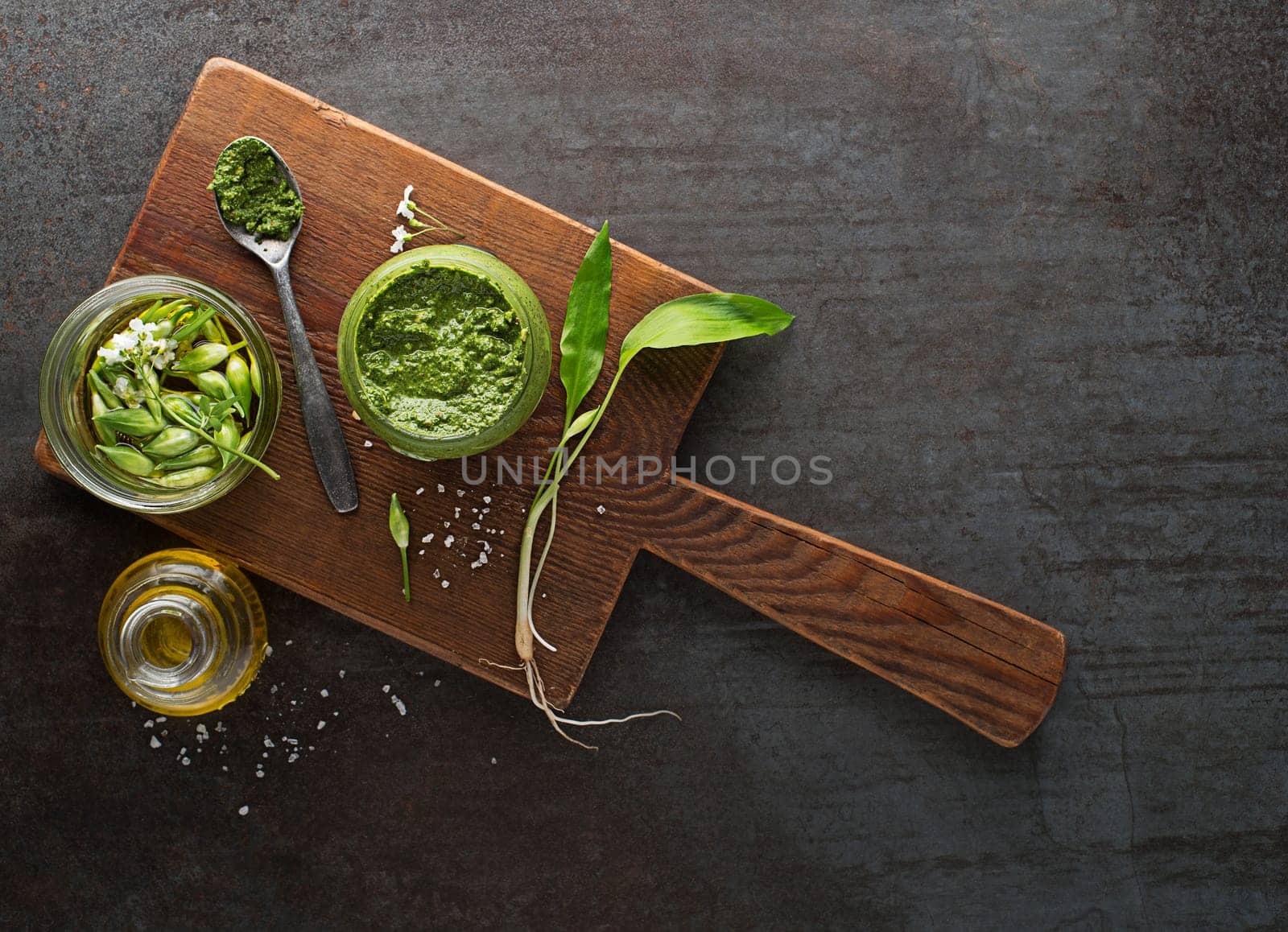 Making Fresh ramson or wild garlic pesto. Healthy spring food concept