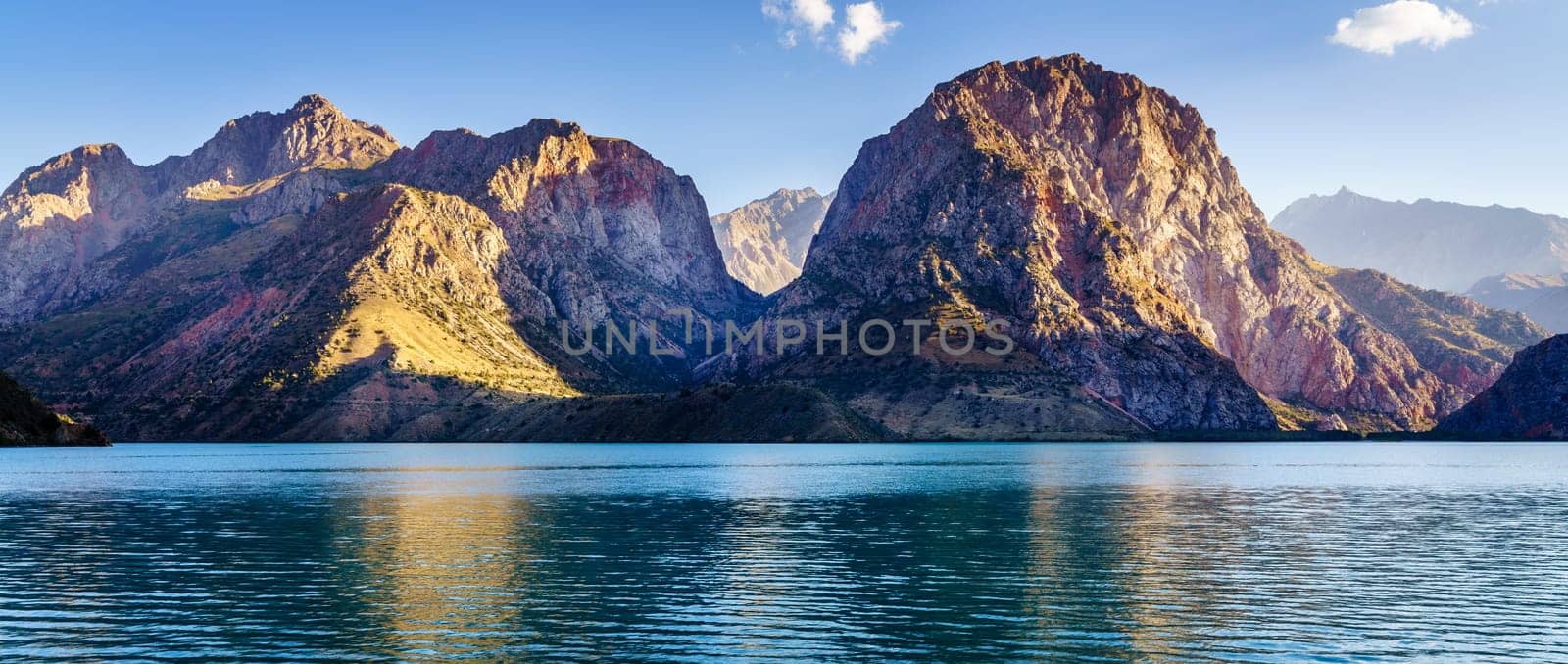 Scenic view of Iskanderkul - an alpine lake in the mountains of Tajikistan