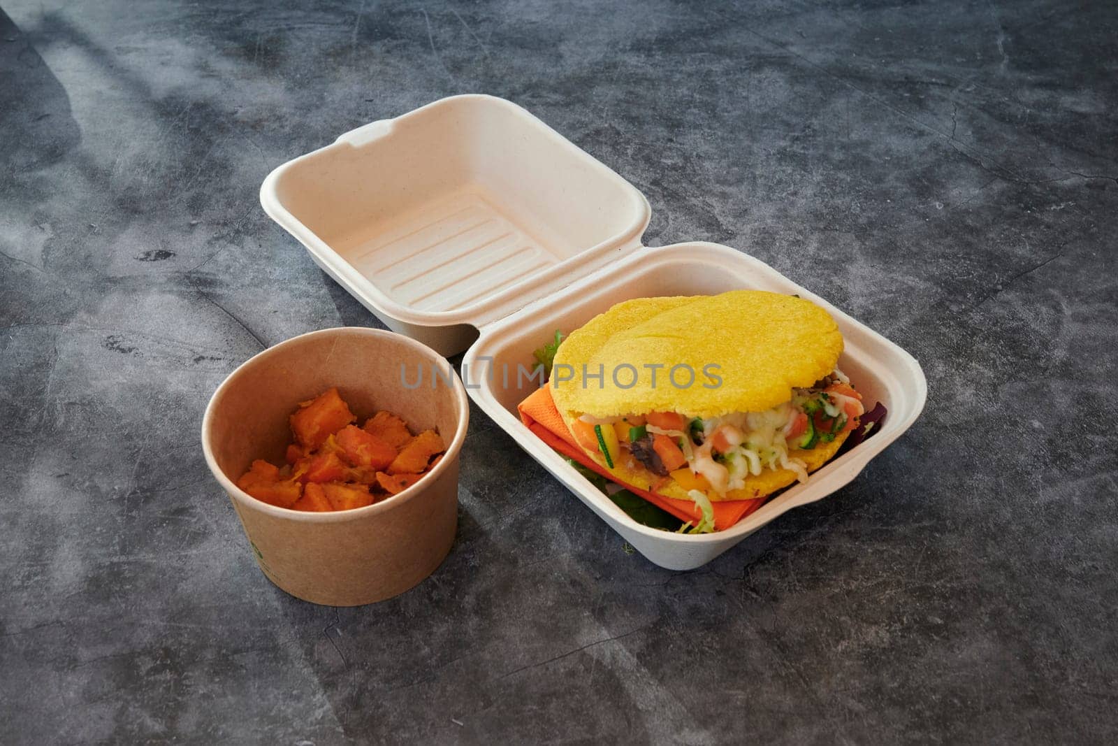 Selection of healthy food on rustic wooden background