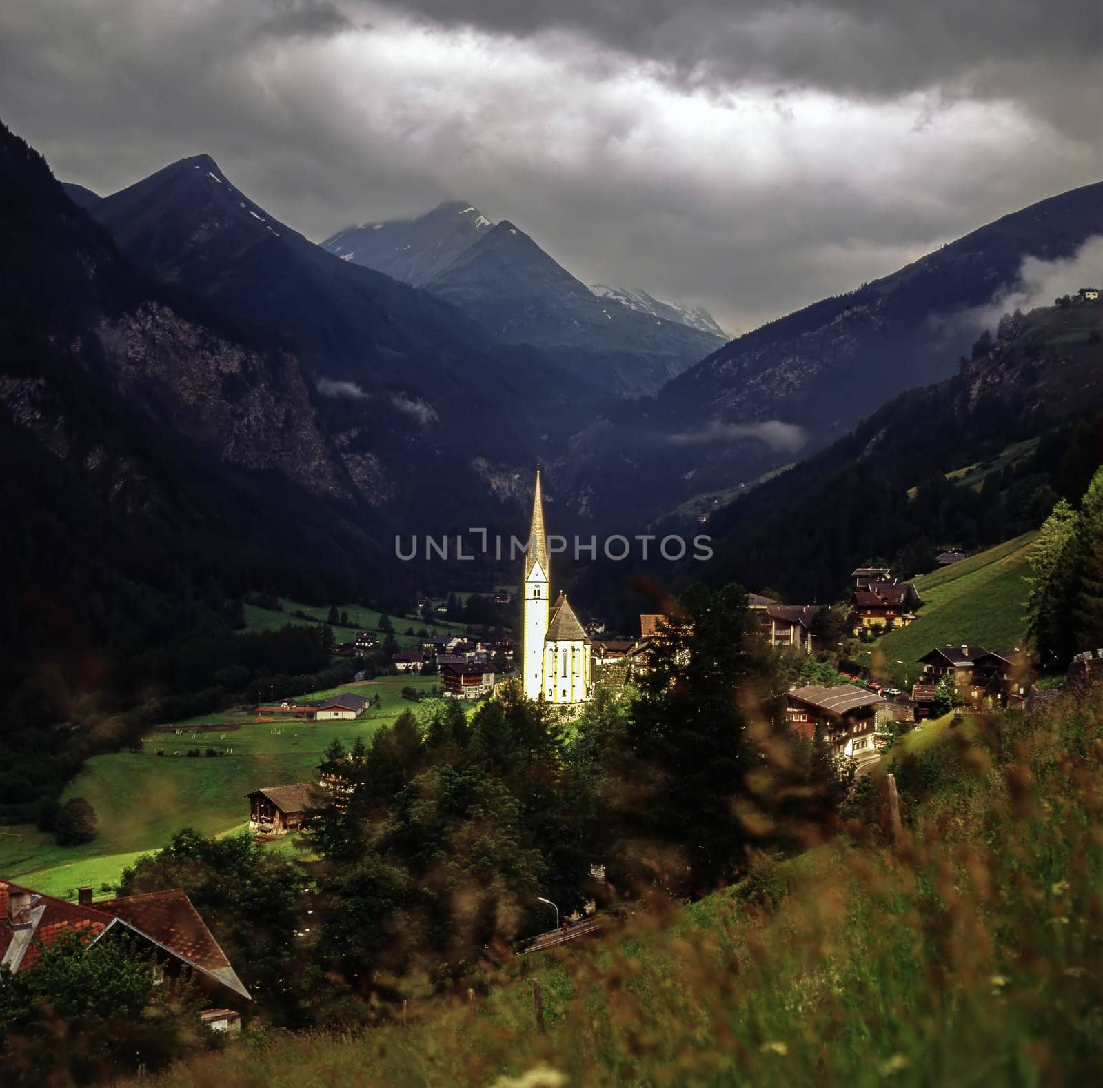 Alpine village Heiligenblut with church St.Vincent in Austria