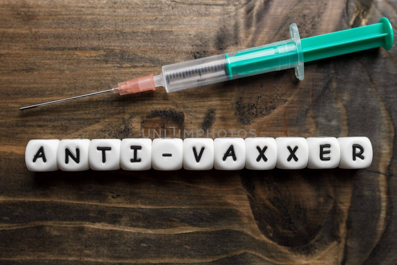 Corona virus Covid-19 vaccine text on wooden background