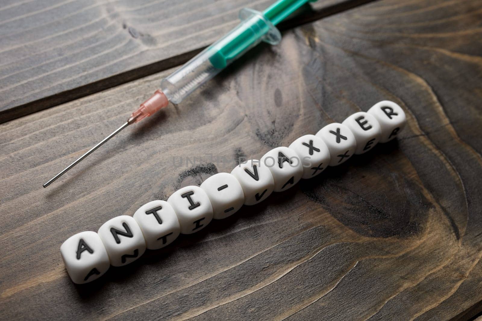 Corona virus Covid-19 vaccine text on wooden background