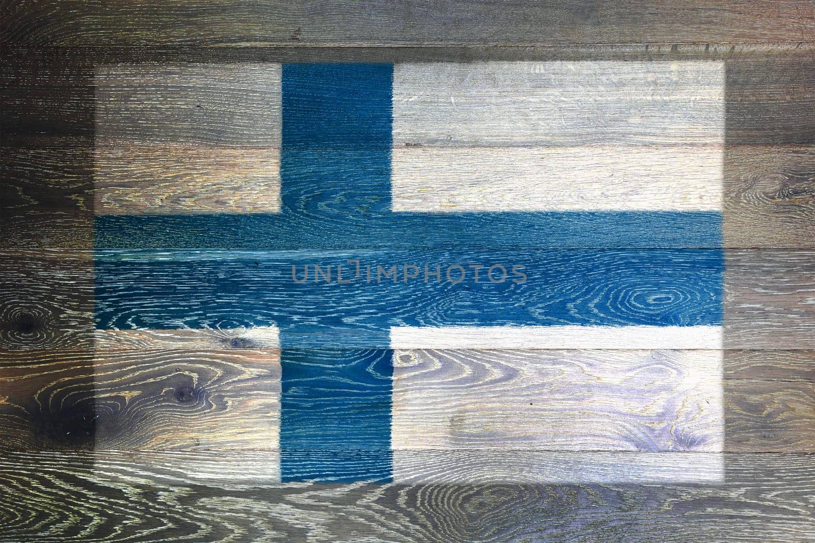 A Finland flag on rustic old wood surface background