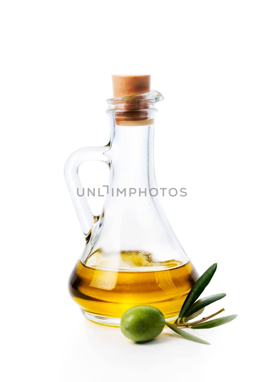 Olive oil bottle and olive fruit isolated over white background