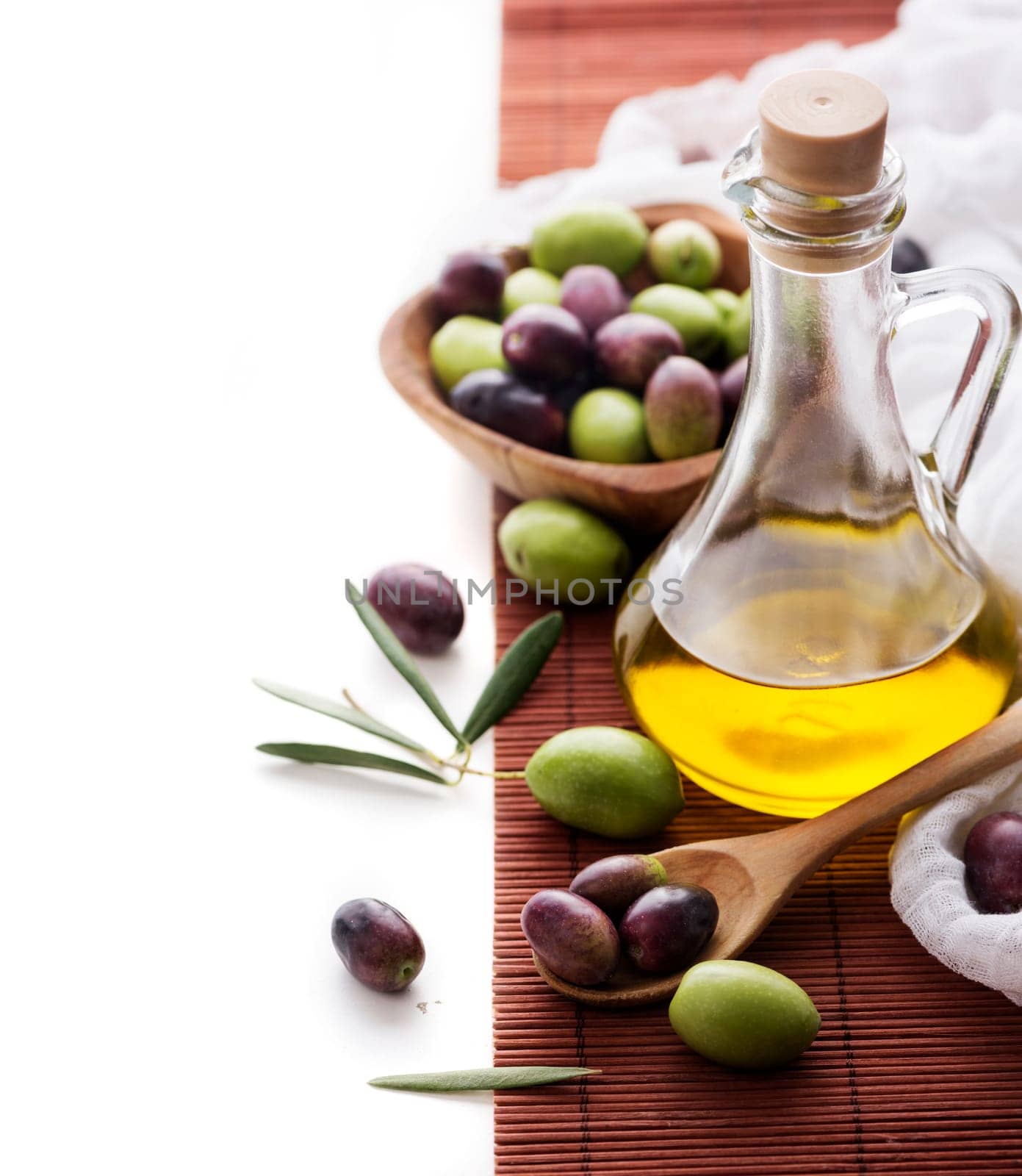 Olive oil bottle and olive fruit with copyspace