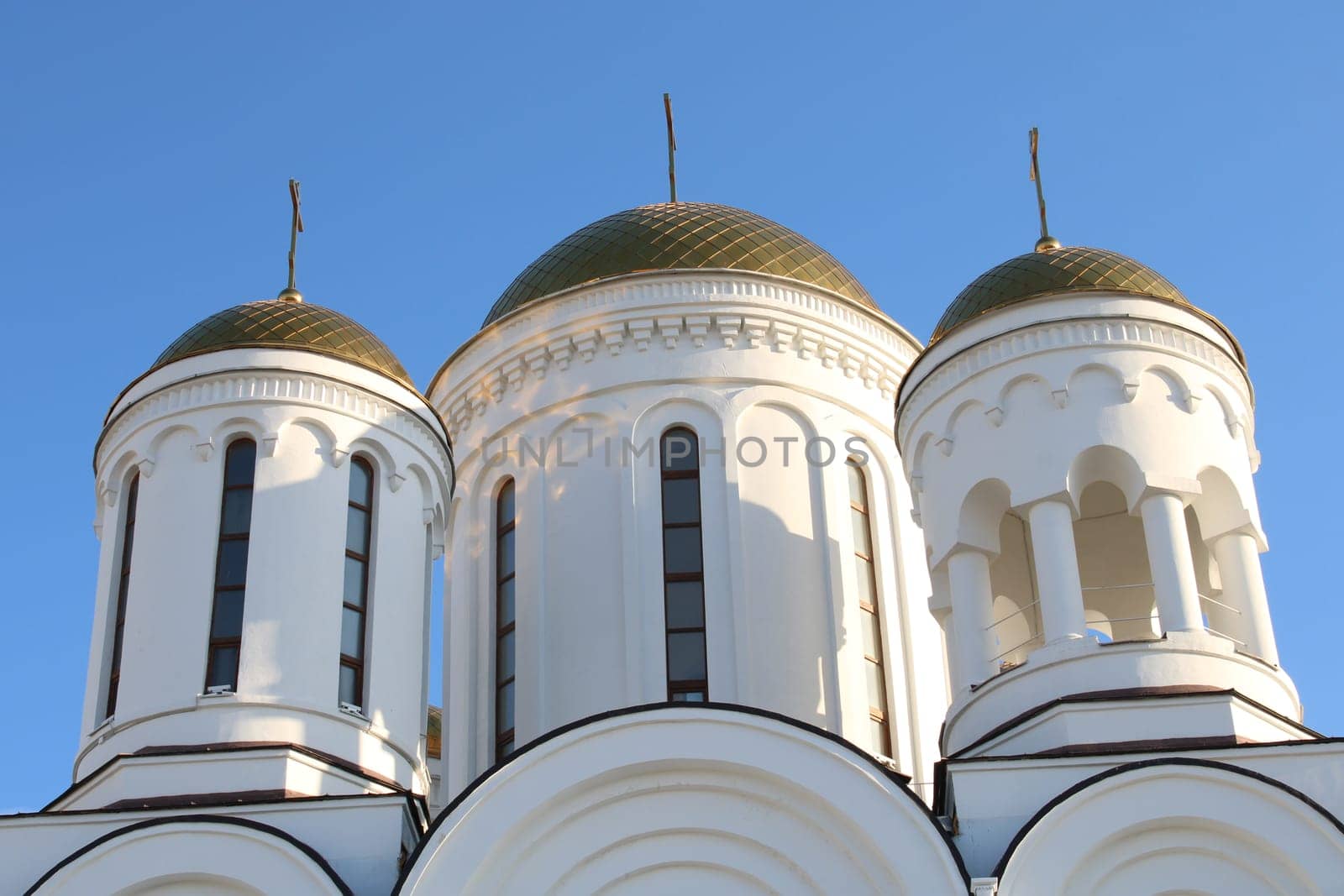 White stone church on a sunny day. Religion. Orthodoxy.