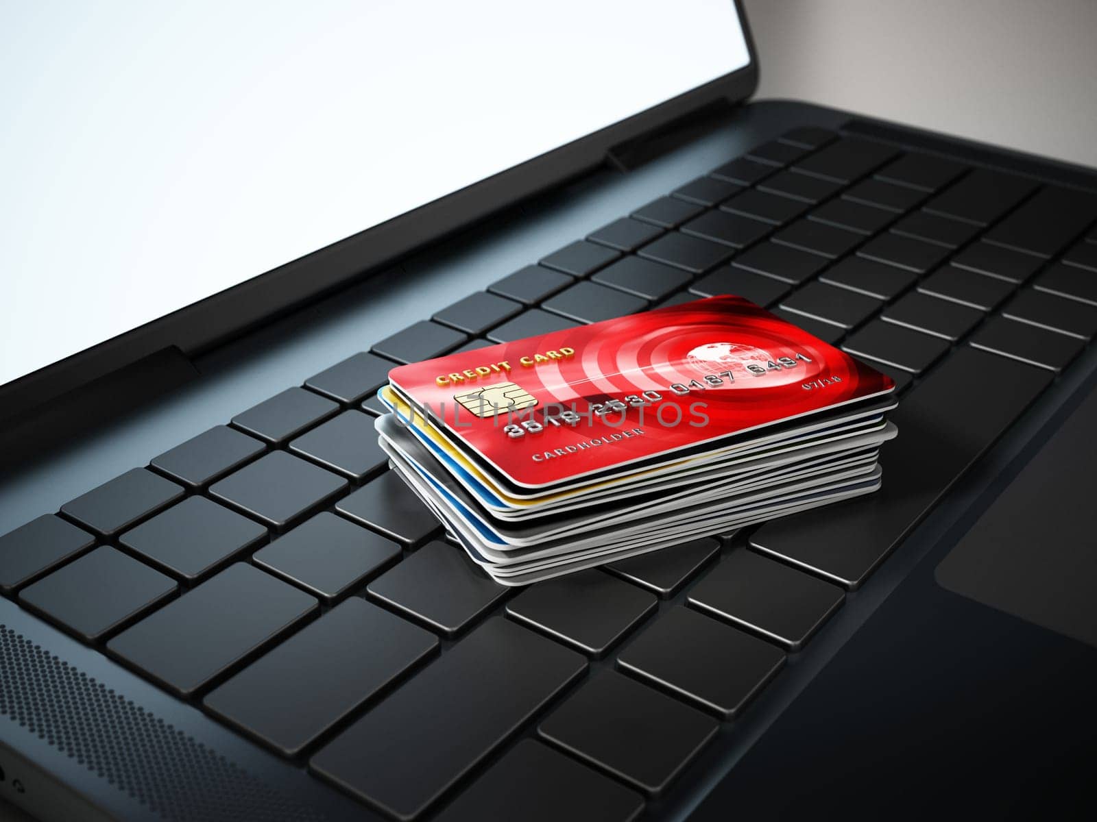 Credit cards standing on laptop computer keyboard. 3D illustration.