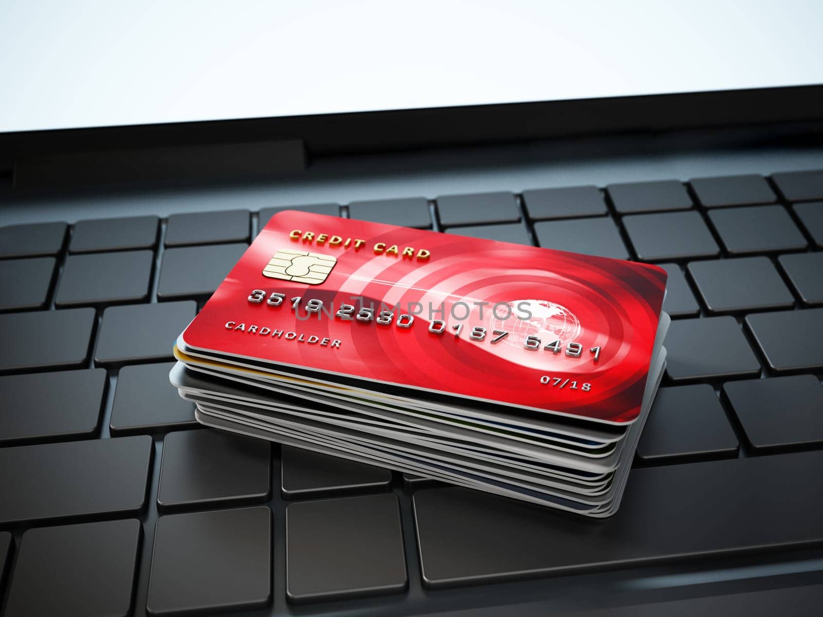Credit cards standing on laptop computer keyboard. 3D illustration.