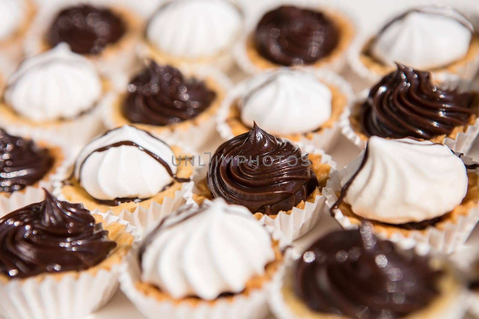 white and black meringue cookies. Creative background