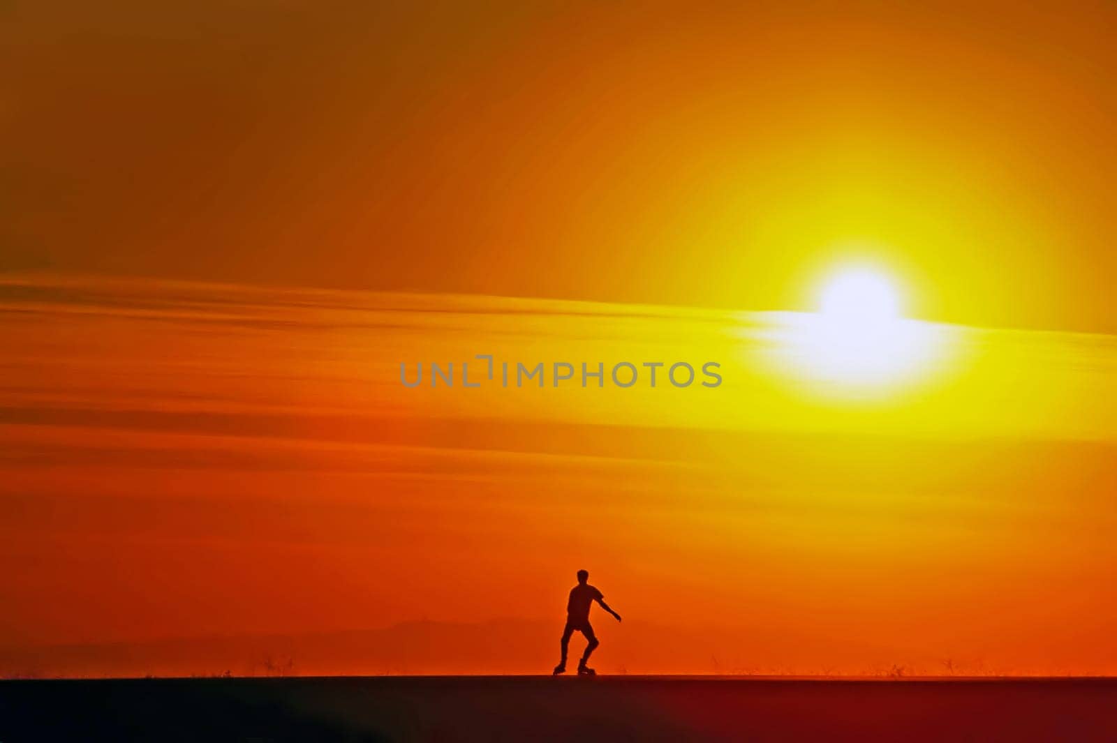 Roller Skating at sunset  by Lake Miramar in San Diego