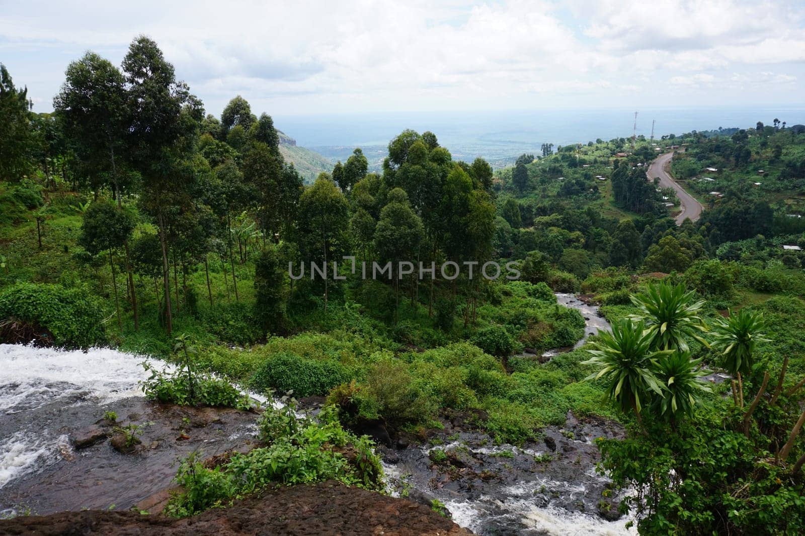 Picturesque view following the water from one of the Sipi Falls, eastern Uganda