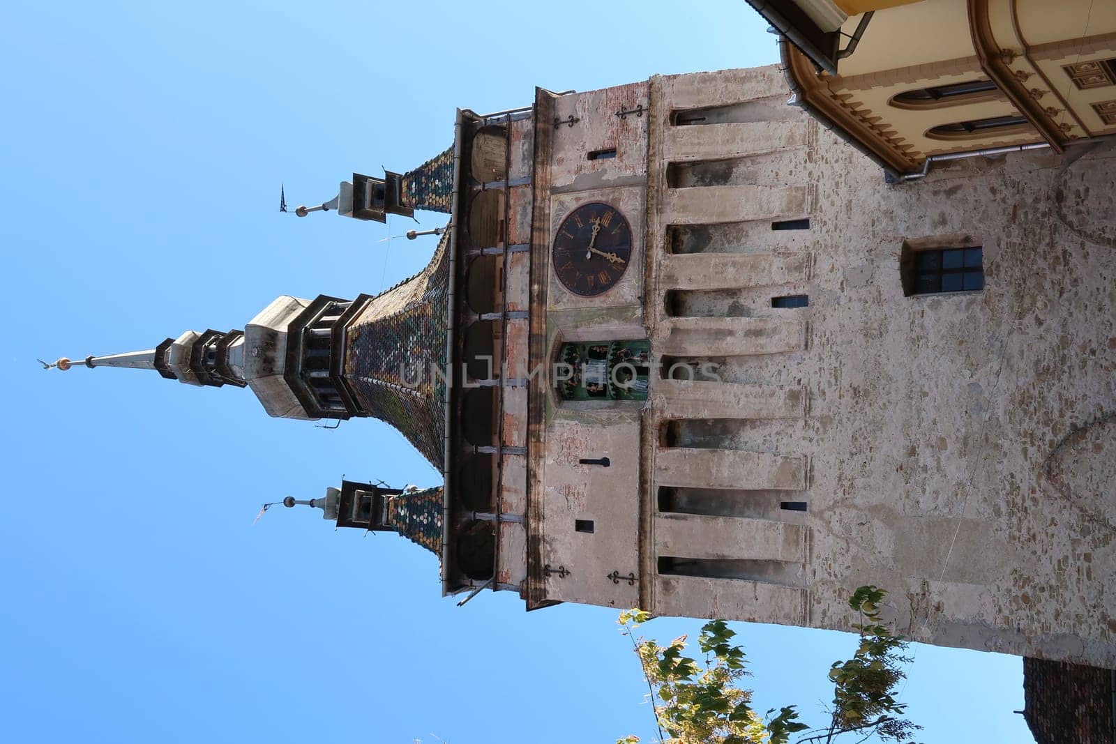 View onto Sigishoaras famous Clock Tower from inside of the citadel, Romania 2021
