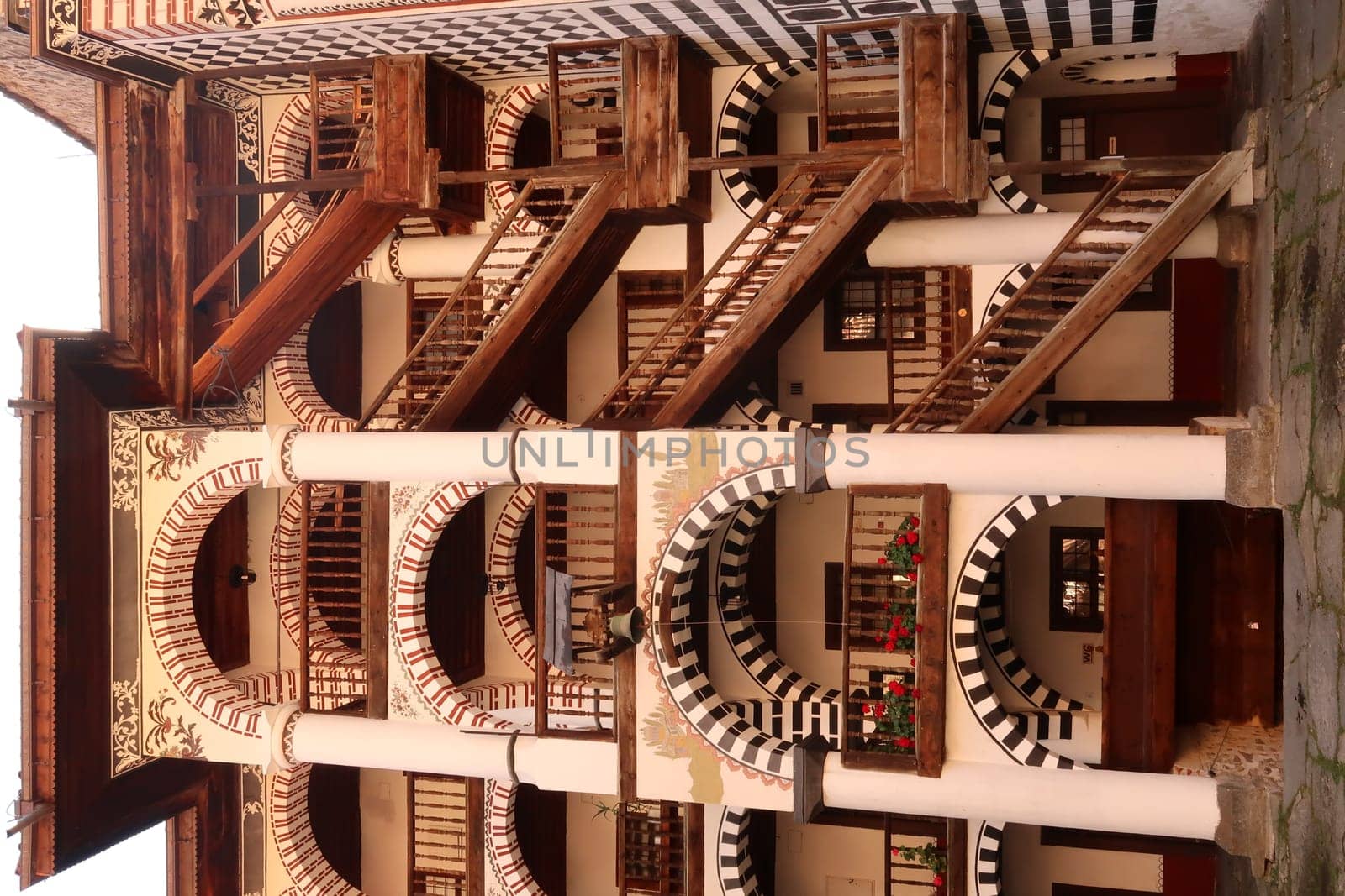 Closeup on the many wooden stairs of the residential part of Rila Monastery, Bulgaria 2021