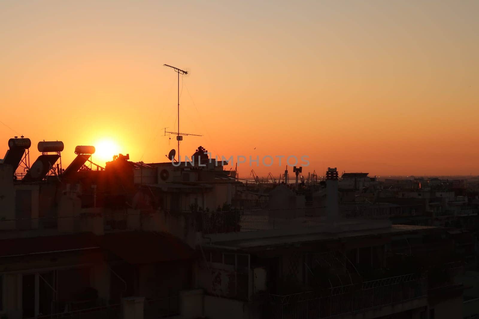 Picturesque view from a rooftop in downtown Thessaloniki at sunset, Greece 2021