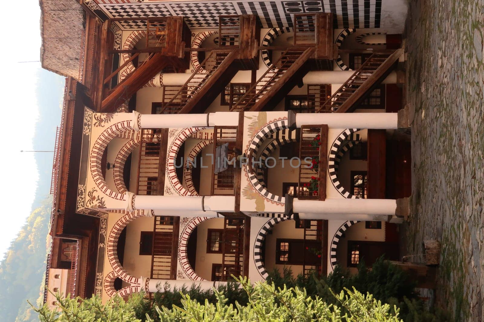 View onto one of the staircases of the residential part of Rila Monastery, Bulgaria 2021