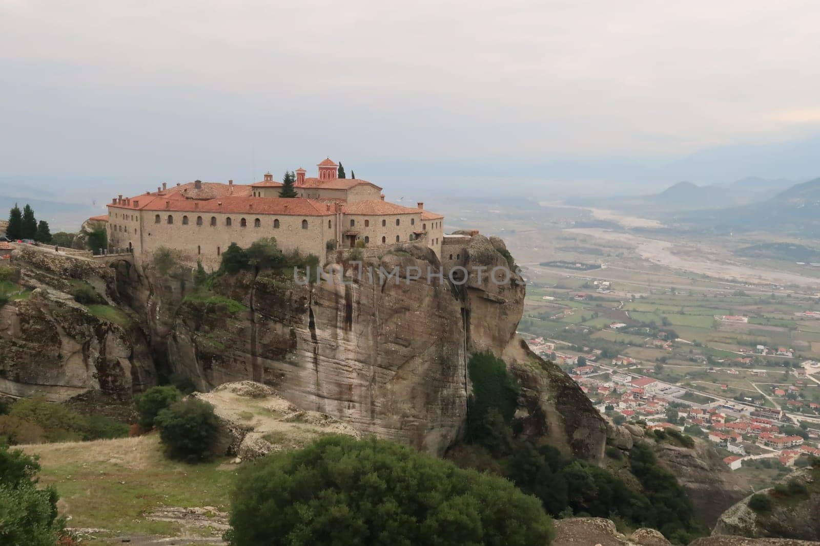 St. Stephen Monastery with the town Kalambaka in the background, Meteora, Greece 2021