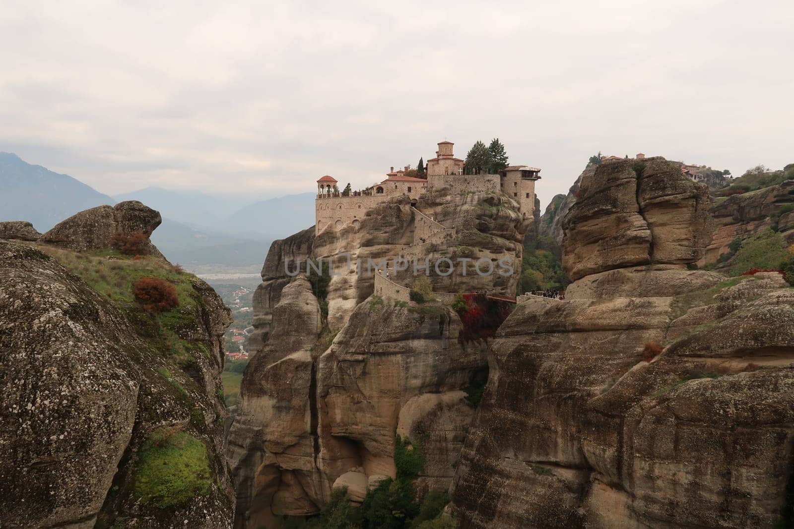 The Monastery of Varlaam appearing between rock formations, Meteora, Greece 2021
