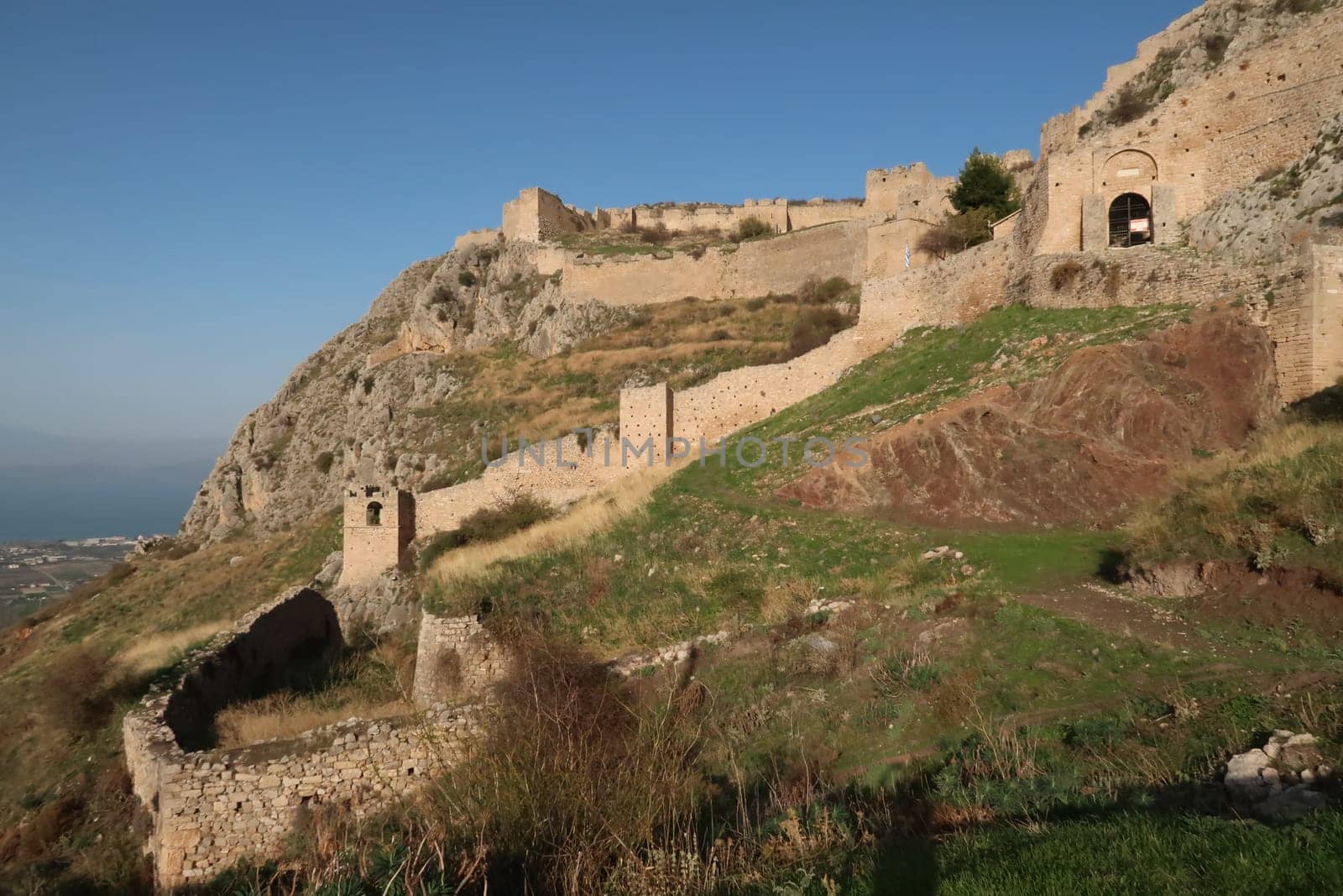 The impressive walls of the Acrocorinth, built on steep hills, Corinth, Greece 2021